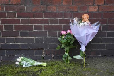 Woman charged with murdering baby girl after she fell from height