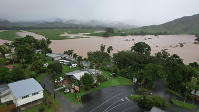 Intensifying storm looms for flood-soaked communities