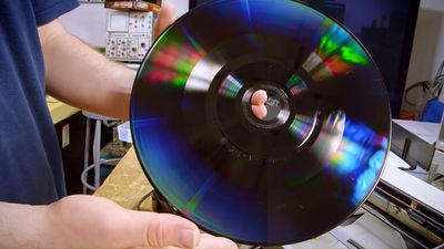 Microscopes can clearly see the video on the surface of a CED 'LaserDisc,' discovers Techtuber — a 12-inch vinyl-like disc that stores SD analog video