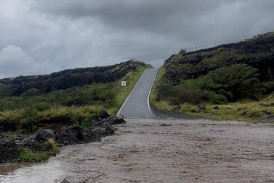 Flights cancelled and roads underwater as storms pummel US