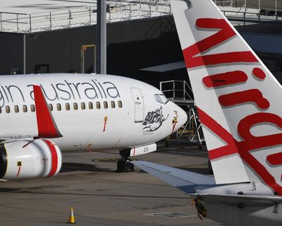 Virgin Australia flight met by firefighters at Melbourne airport after smoke seen coming from vape