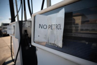 Dozens of petrol stations around Australia run out of fuel as panic-buying continues