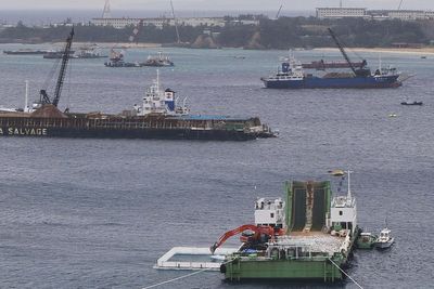 Two dead after boats carrying students capsize off US base construction site in Japan