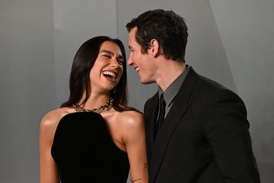 Dua Lipa and Callum Turner lead couples on red carpet at Vanity Fair Oscar Party