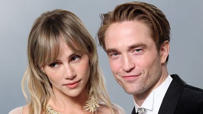 Robert Pattinson And Suki Waterhouse Rock A Tux And Bridal White As He Preps To ‘Marry’ Zendaya In The Drama