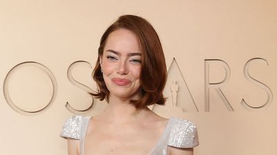 Emma Stone brings an ethereal touch to the Oscars red carpet in a fully sequinned dress