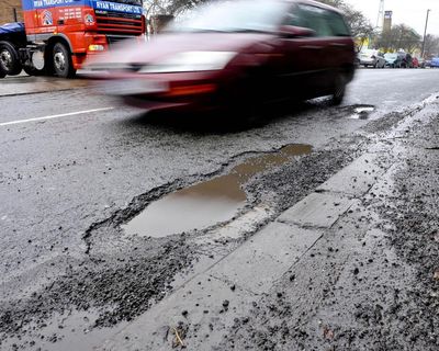 ‘National disgrace’: pothole repair backlog hits record £18.6bn in England and Wales
