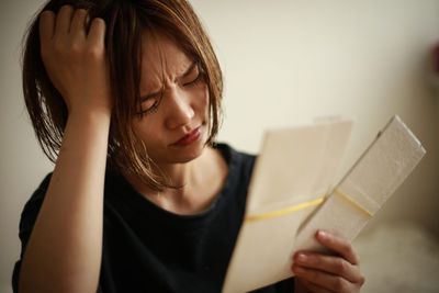 America's economy is so bad that it's driving a loneliness crisis, as two-thirds skip weddings and dinners to make ends meet