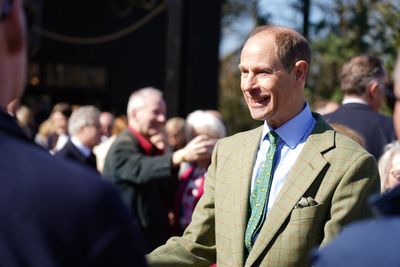 Duke of Edinburgh goes behind the scenes at zoo to prepare gorilla food