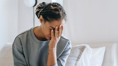 A woman’s holiday took a chilling turn after a falling suitcase revealed a life-changing secret