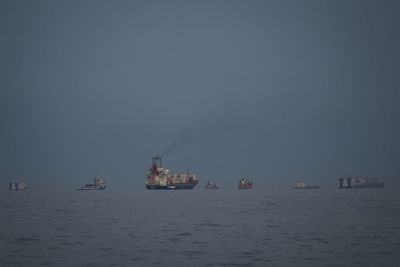 India and Pakistan-flagged vessels cross the Strait of Hormuz