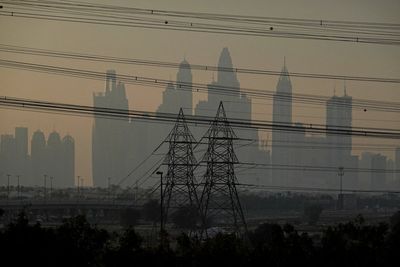 Loud booms heard in Dubai as Iran retaliates after death of security chief