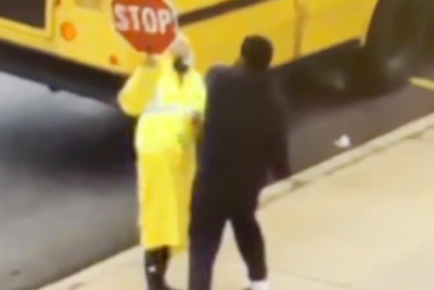 Impatient driver leaps out of car and punches female crossing guard ‘for taking too long to get children across street’