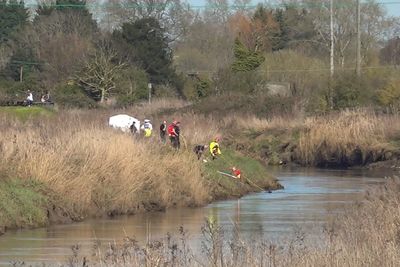 Teenager’s body found after car crashes into river
