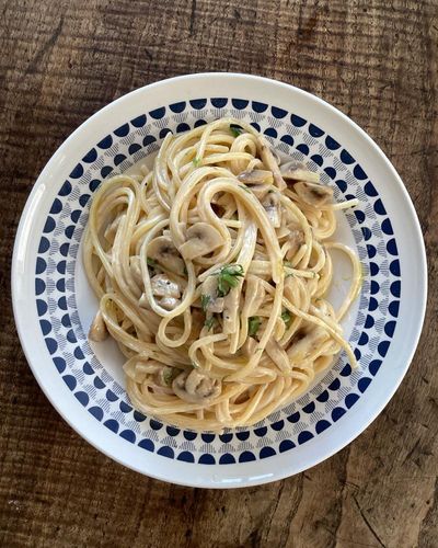 Rachel Roddy’s recipe for spaghetti with mushrooms, soft cheese and herbs