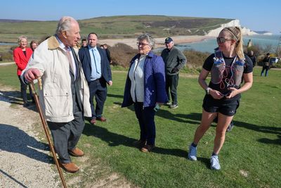 King Charles surprises hikers on coastal walking path named after him