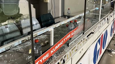 Coach injured by shattered glass at Canberra Stadium