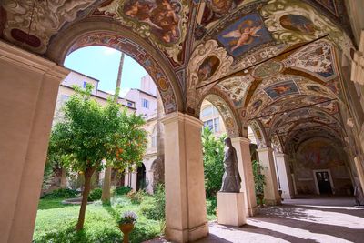 A hidden cloister in the center of Rome has a turbulent past etched on its walls