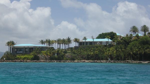 Missouri churchgoers are stunned as connections between their pastor and Jeffrey Epstein’s private island come to light