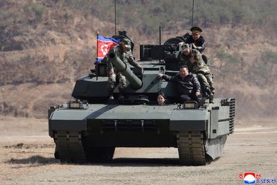 Kim Jong Un’s teenage daughter drives new anti-drone tank in North Korean training drill