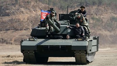 Teenage daughter of North Korean leader Kim Jong-un drives tank at military drill