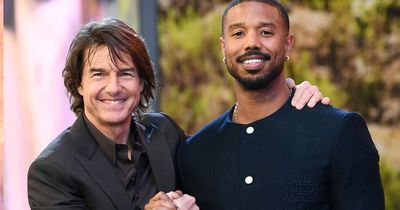 “Seems Terrifying”: Fans Spot Bizarre Detail In Photo Of Tom Cruise Hugging Michael B. Jordan