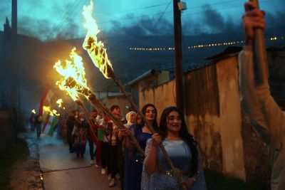 Syrian Kurds return home to celebrate Nowruz for the first time since exile