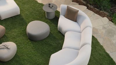 I'd Have Never Known This Sofa Was for a Garden If I Saw It in a Showroom — Its Iconic, Curved Silhouette Looks Good in Rain, Hail, or Shine