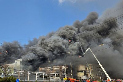 South Korean officials investigate what caused massive factory fire that killed 14