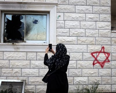 Israeli settlers carry out series of West Bank attacks as security forces stand by