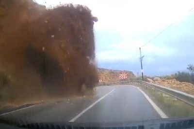 Car buried by sudden landslide on Turkish coastal road