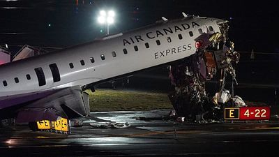 Two pilots killed after Air Canada plane collides with vehicle at New York's LaGuardia Airport