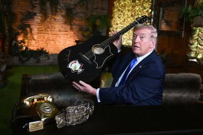 Trump struggles to name an Elvis song during impromptu Graceland visit
