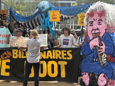 Climate Activists Confront Iran War Profiteering at Big Oil Confab in Houston