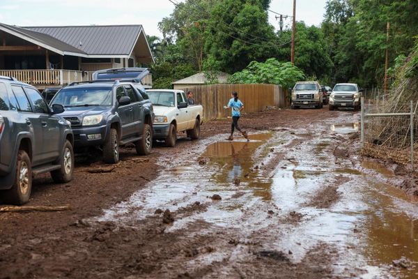 Red volcanic mud coats homes after Hawaii’s worst floods in 20 years