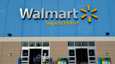 Woman pulls up her bank account balance after someone called her broke while waiting in line at Walmart