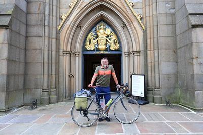 'I would encourage everybody to cycle to their local cathedral and just go and listen': meet the man on a mission to save choral music by bike