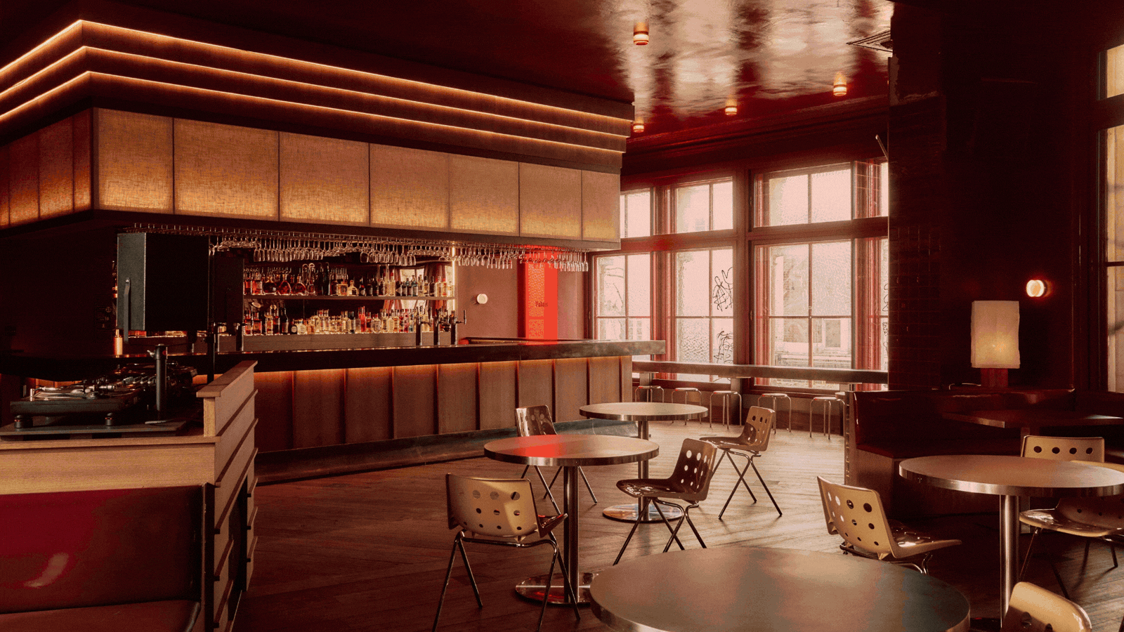 Why Are All the Coolest Bars Painted Red Right Now? Design Notes From These "Intimate and Transportive" Spaces You'll Want to Bring Home