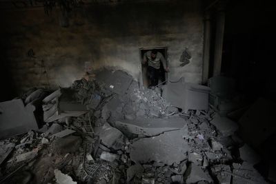 In a southern Lebanese city emptied by Israel's offensive, some vow to stay put