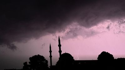 First snow falls as sudden chill brings wild weather