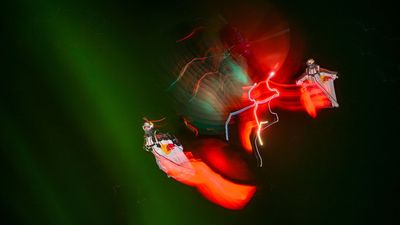 Photographer captures seemingly impossible long exposure action shot of skydivers against the northern lights while flying over 100MPH in sub-zero temperatures