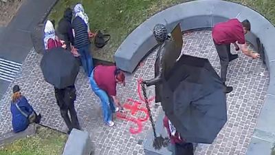 Group of women bailed after allegedly defacing statue