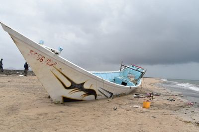 Migrant boat capsizes leaving at least 9 dead and 45 missing