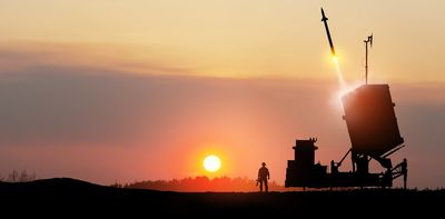 How do Israel and Iran’s nuclear status differ under international law?