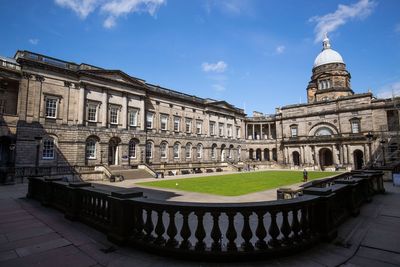 Staff at University of Edinburgh strike over proposed cuts
