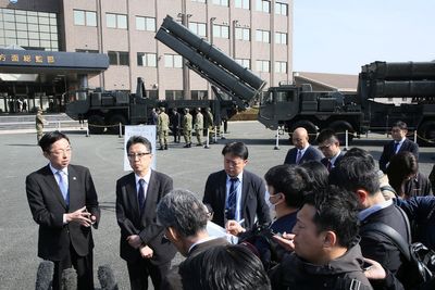 Japan unveils new long-range missiles across its islands to defend itself