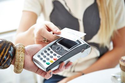 Jim Chalmers claims removing card surcharges will ease cost-of-living pressures. But will you be better off?