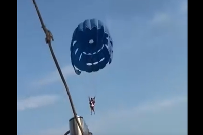 Parasailing cable snaps in India with tourist plunging into the sea