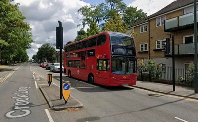 Police van crashes into car on busy south London street - five people rushed to hospital