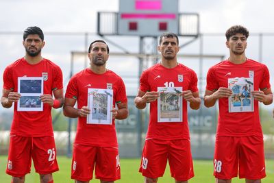 Iran soccer players honor alleged child victims of the war before World Cup warmup